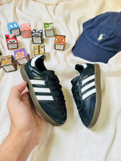 Adidas Samba kids sneakers black white pair