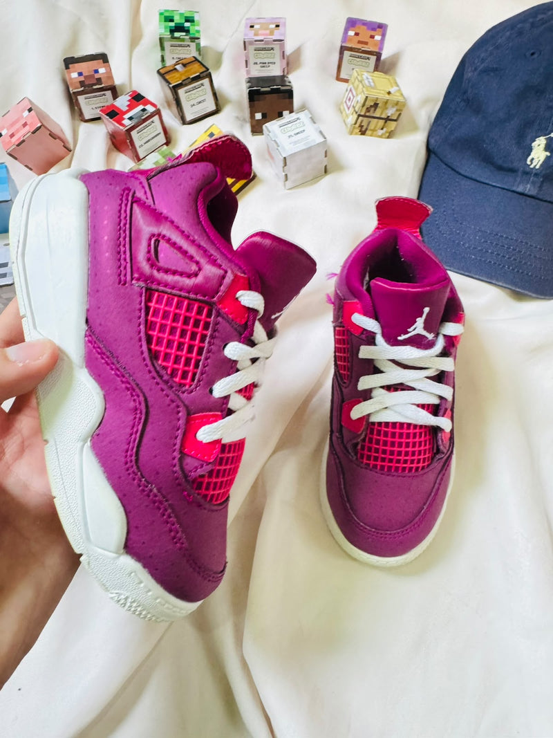 Air Jordan 4 kids sneaker magenta pink side view