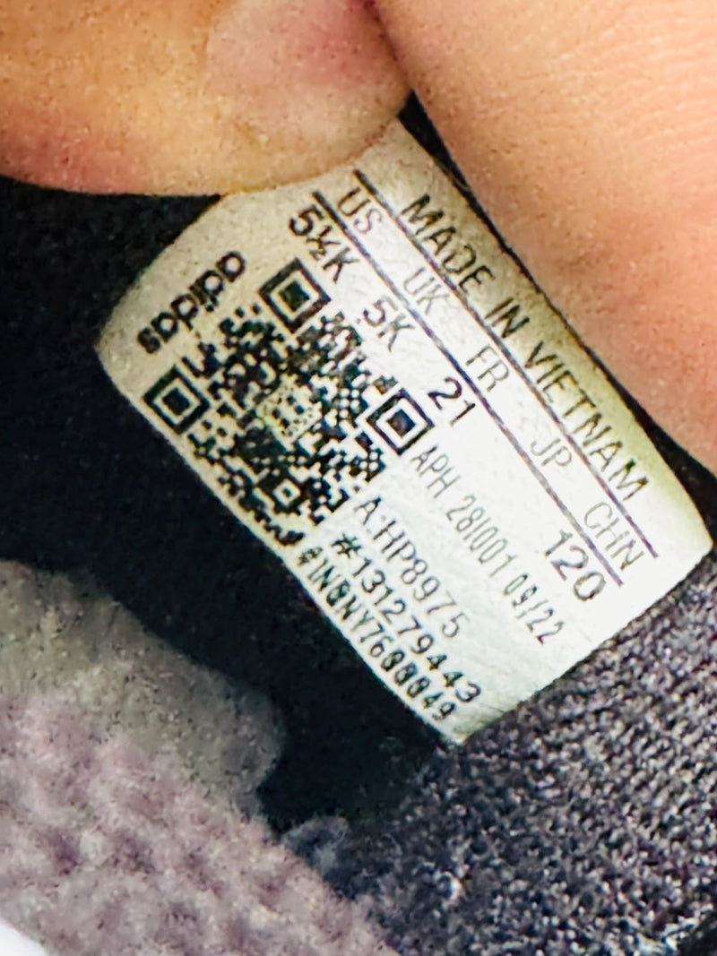 Adidas kids sneaker size label showing 21 FR