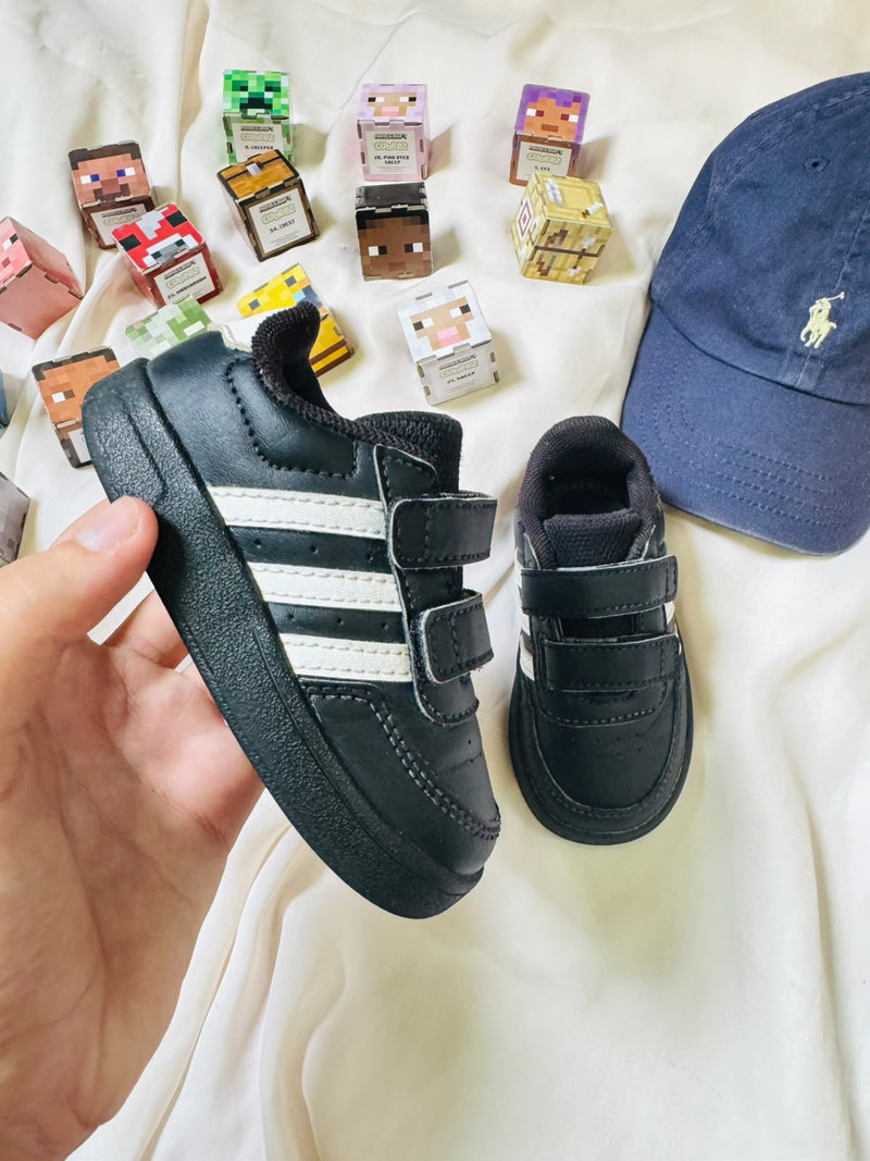 Adidas kids black white velcro sneaker side view