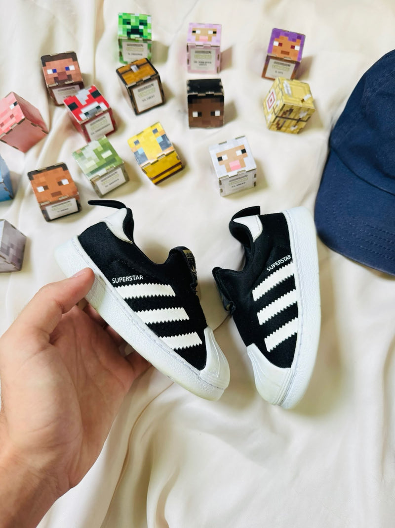 Adidas Superstar kids black white pair