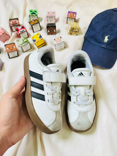 Adidas kids white black gum sneakers pair