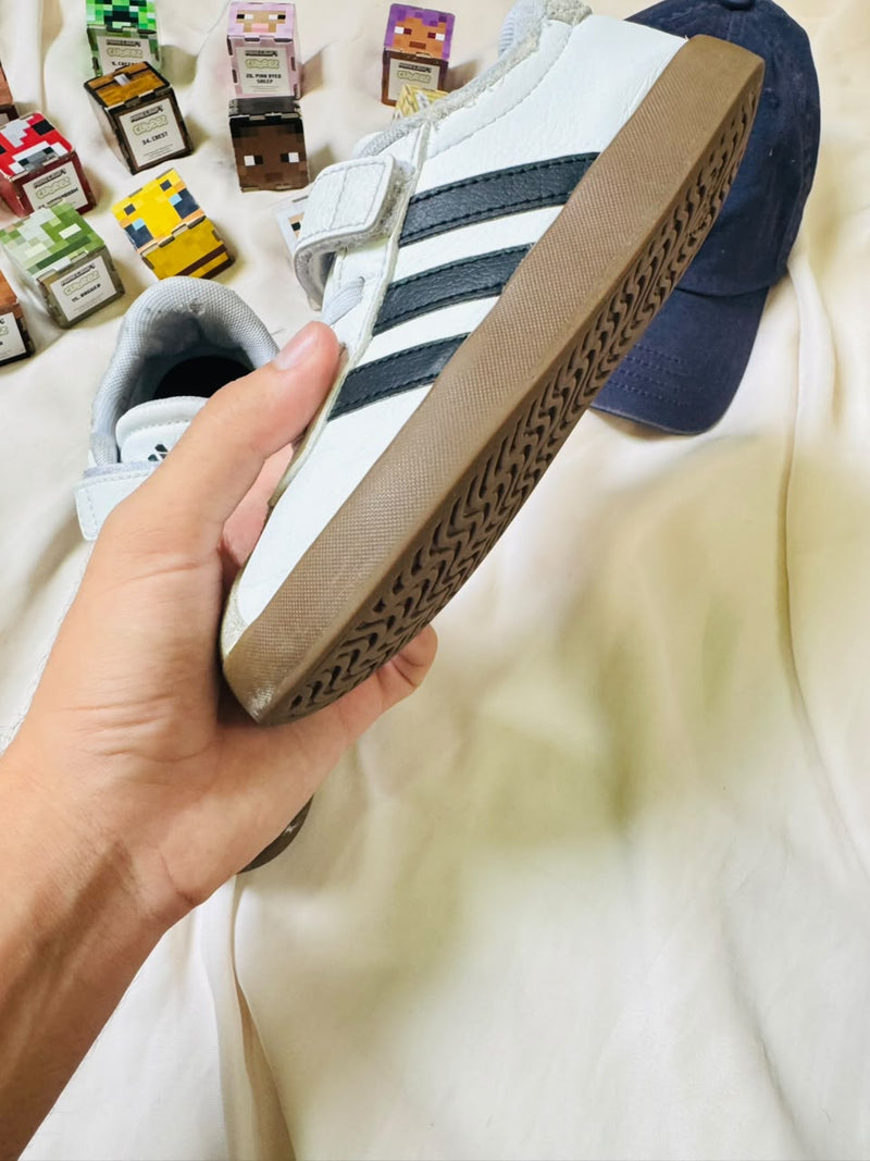 Adidas kids white black gum sneaker side view