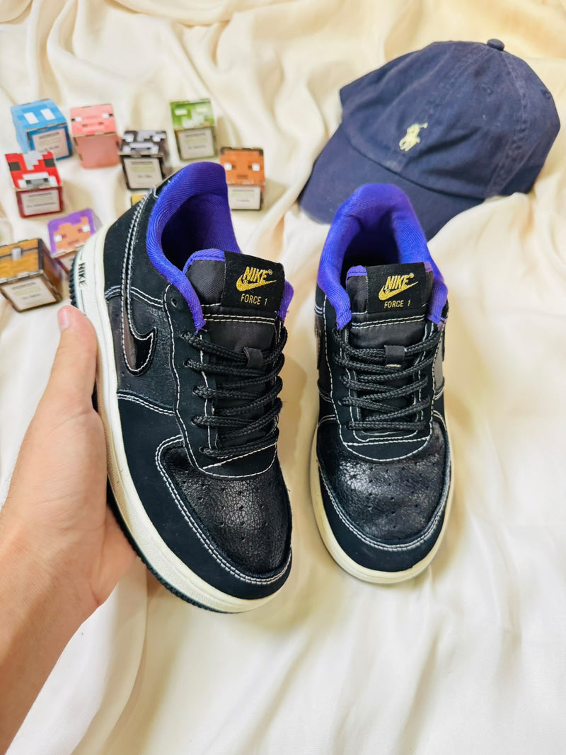 Nike Force 1 kids sneakers black purple front view