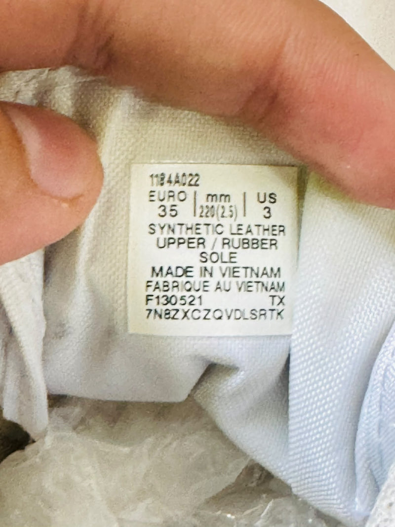 Onitsuka Tiger kids sneaker size label showing 35